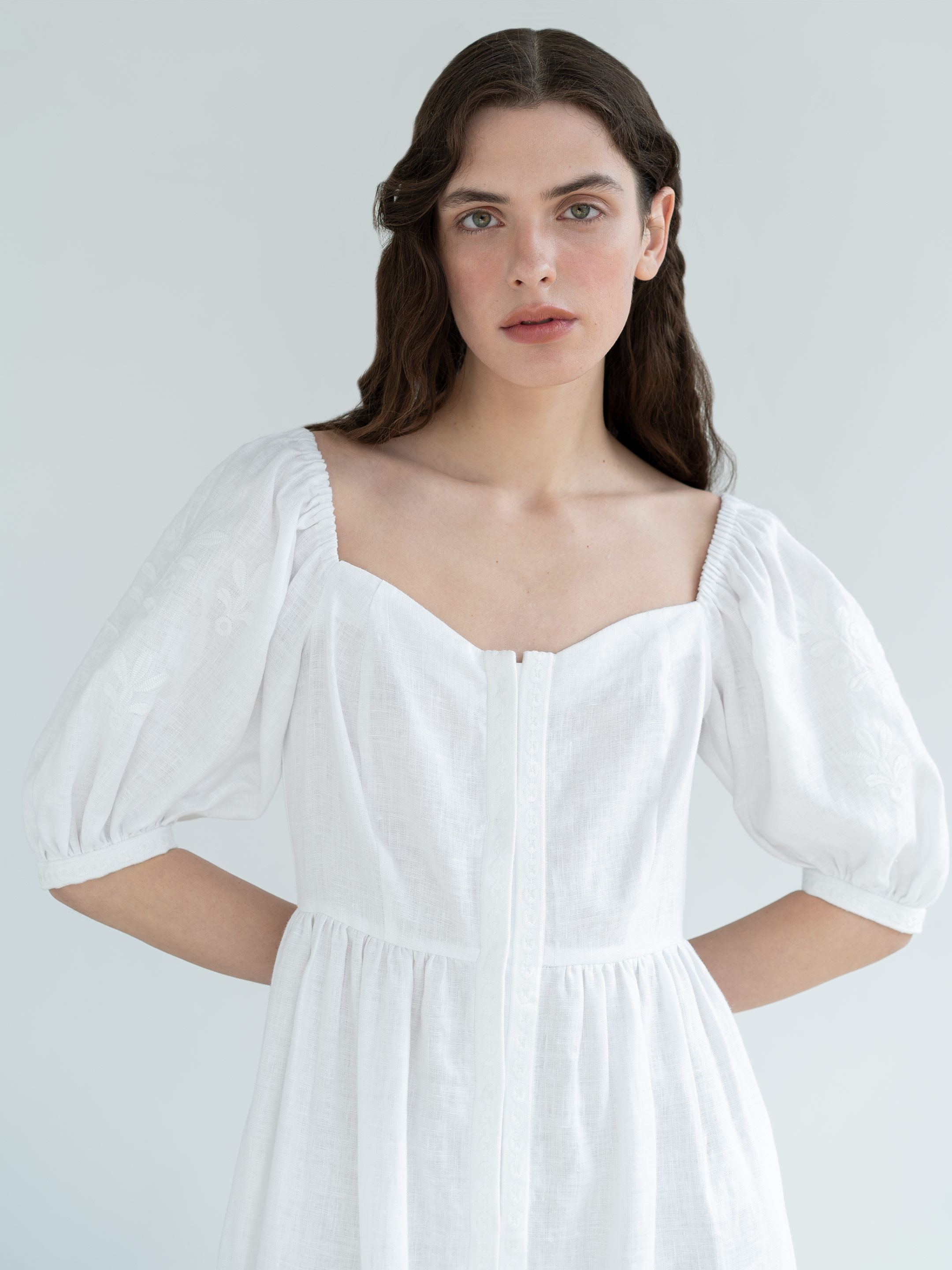 White linen dress with with embroidery in tone Magnolia photo