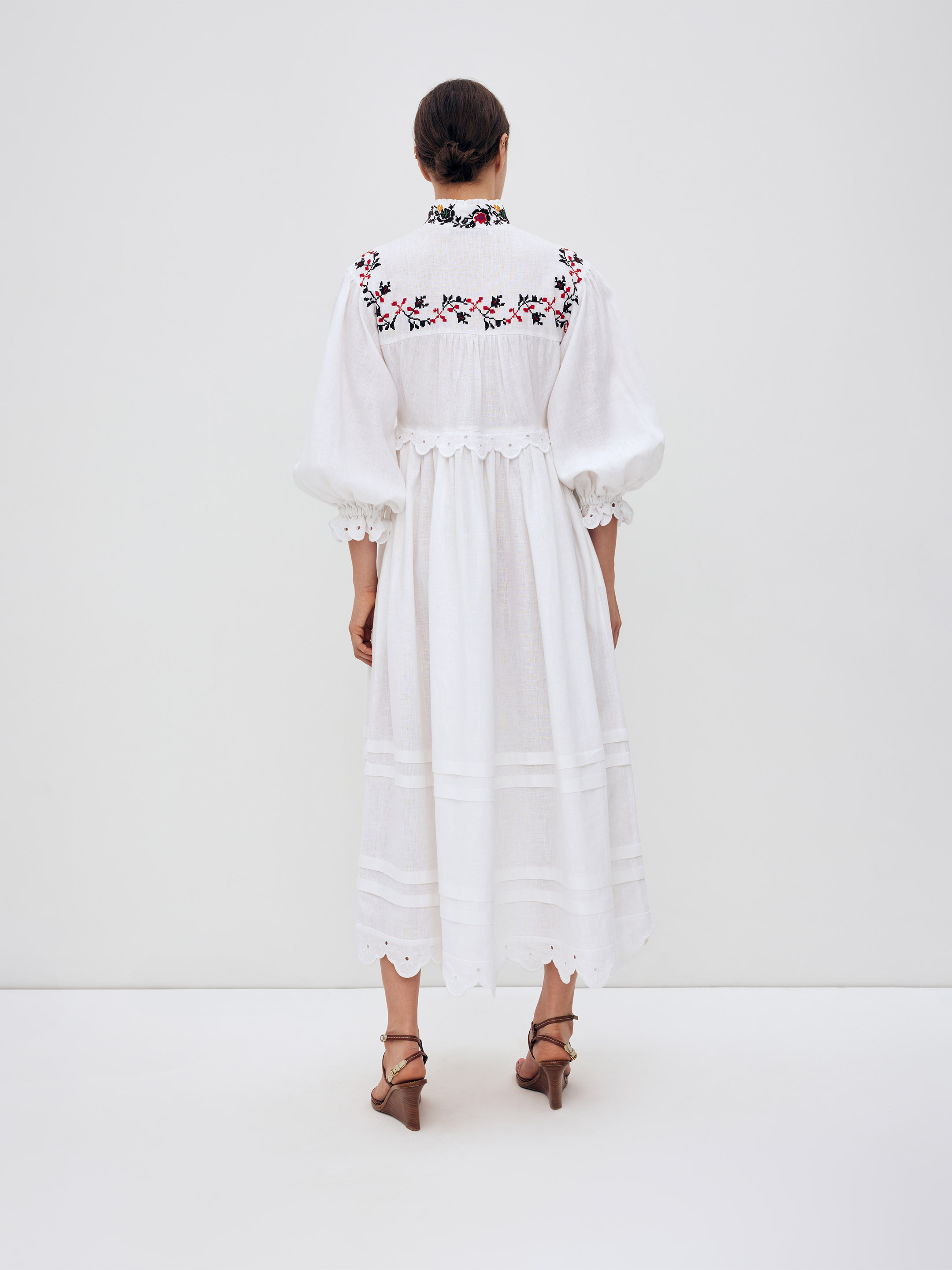 Long embroidered dress with a high neck "Korolivna" fitting