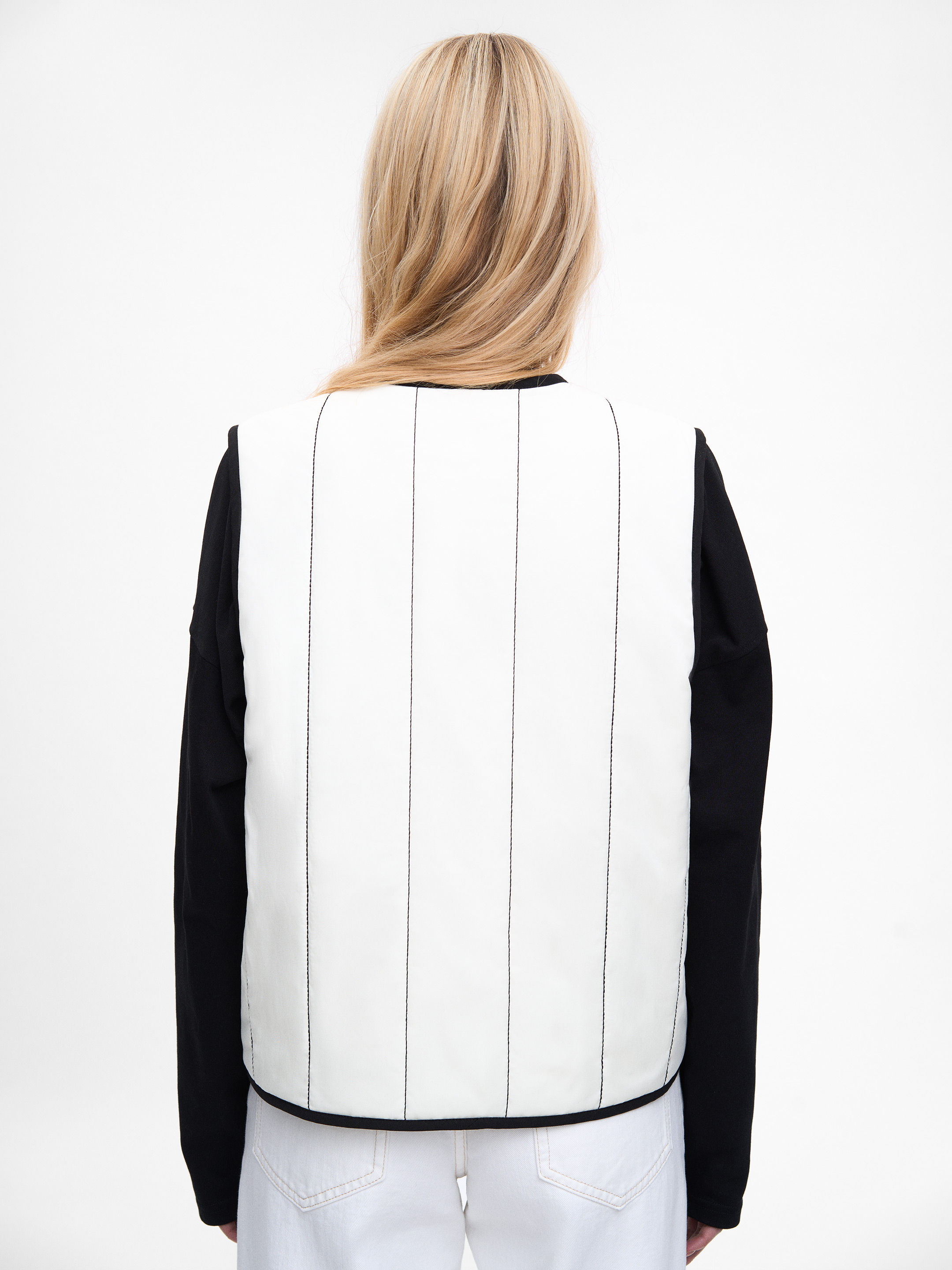 Milky-white vest “Siayvytsia” in Ukraine